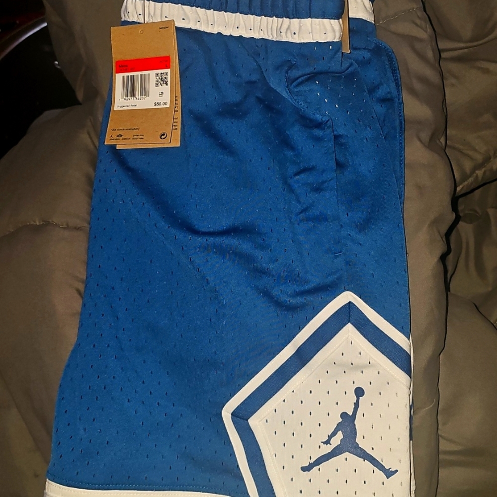 Blue Athletic Shorts with White Trim